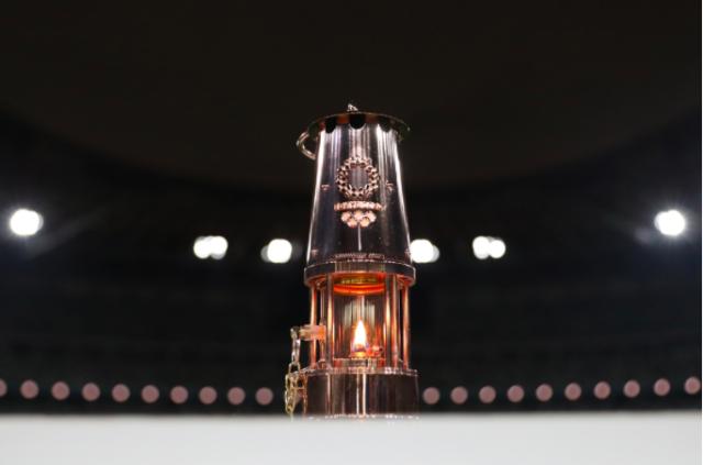 黄金甲体育官方网站-东奥圣火传递启动仪式计划空场举行 表演改为录播